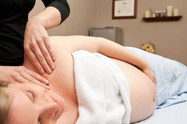 Professional prenatal massage in NYC for back pain relief